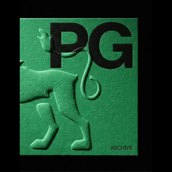 An embossed green book: PG Archive.