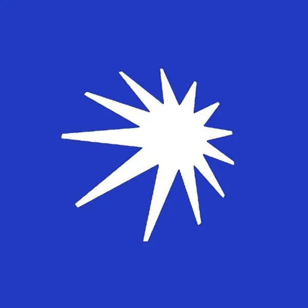A white starburst on blue.